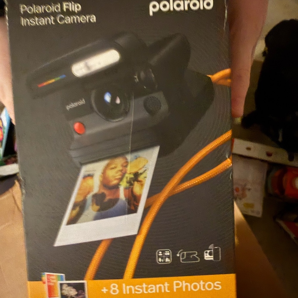 Polaroid Black Instant Camera with Orange Strap Accent